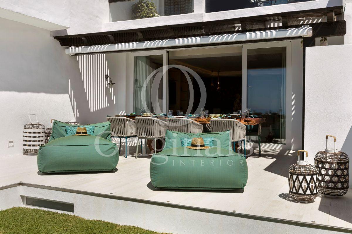 Outside lounge area with green beanbags - Originals Interiors