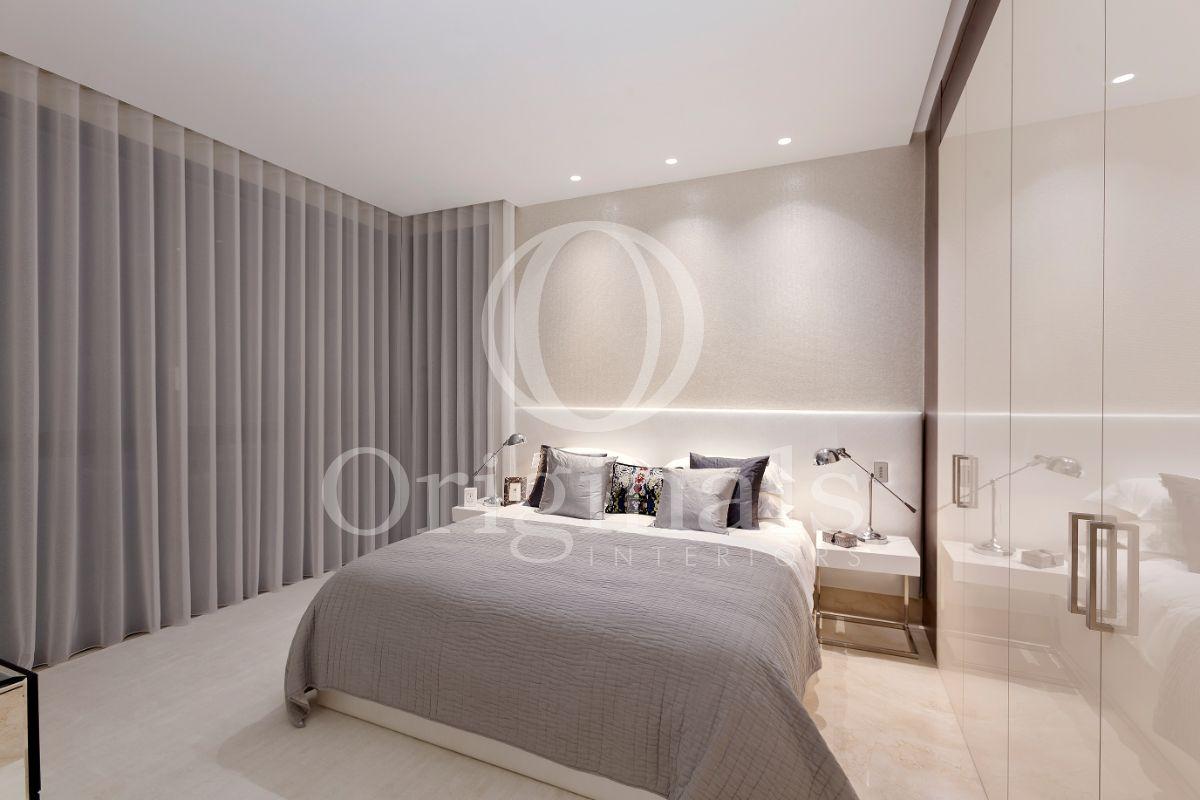 Luxury bedroom with grey curtains and creme wallpaper - Originals Interiors