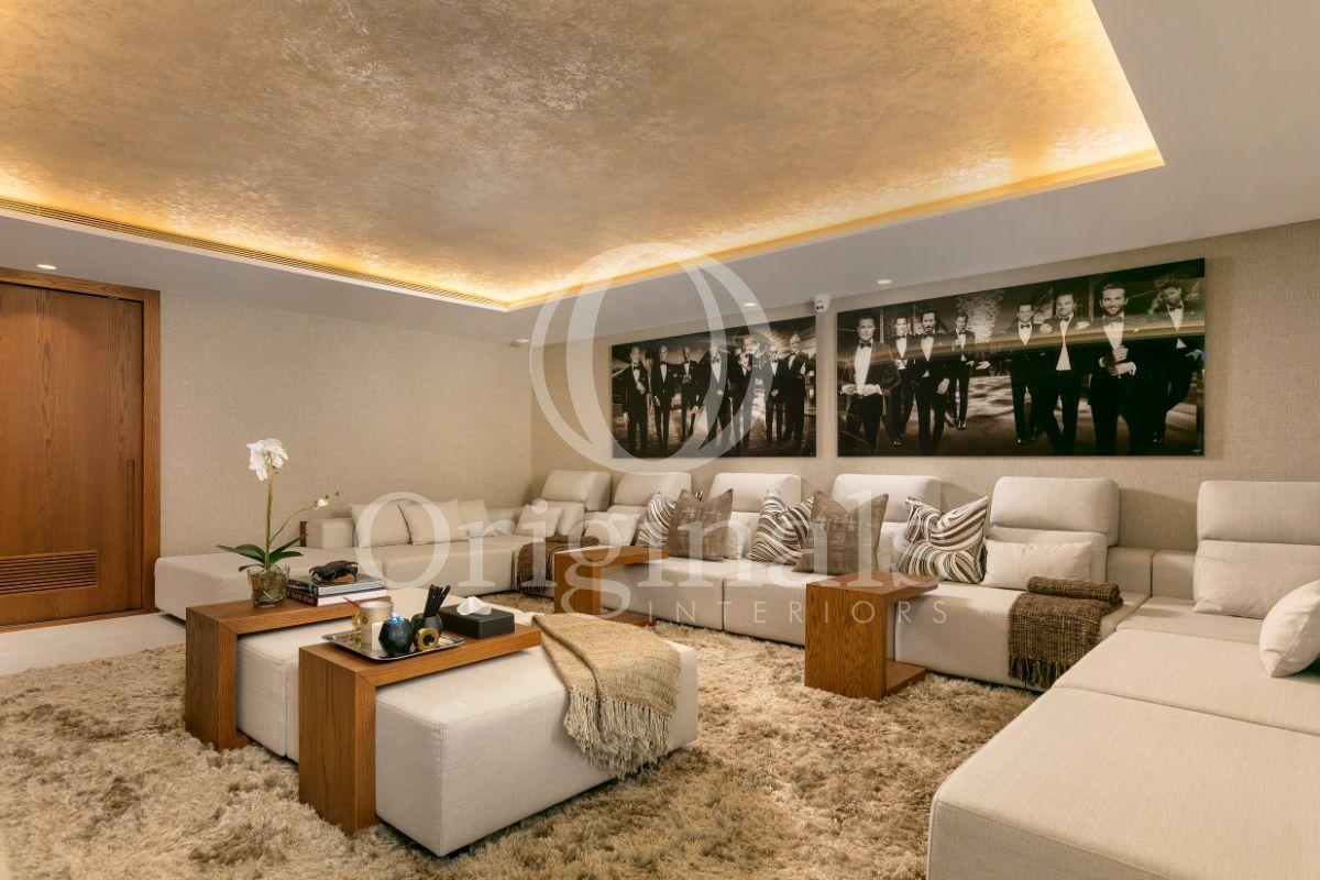Luxury Lounge Area with large photos on the wall - Originals Interiors